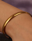 goudkleurige bangle armband